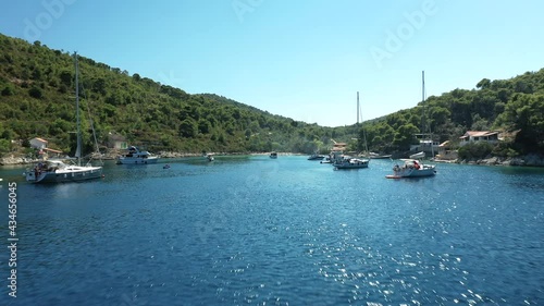 Watercraft Vessels With Tourists On Blue Sea With Calm Waves At Stoncica Beach, Vis Island, Croatia. - aerial photo