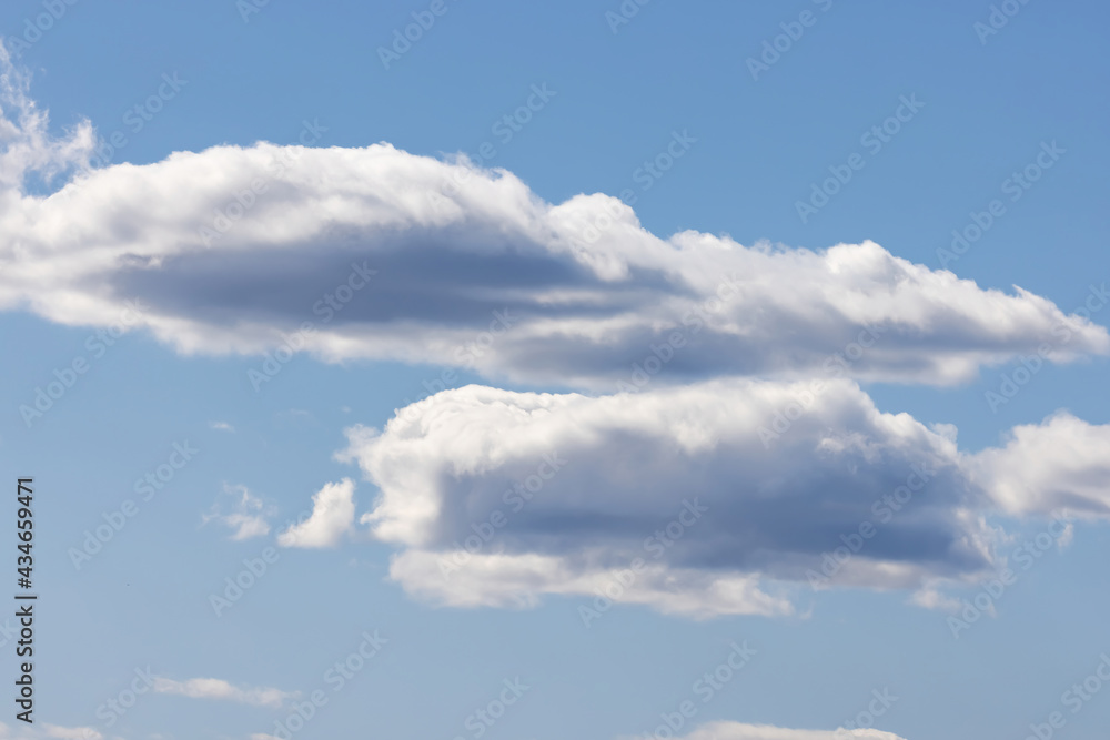 white puffy clouds on a bright blue sky white puffy clouds on a bright blue sky