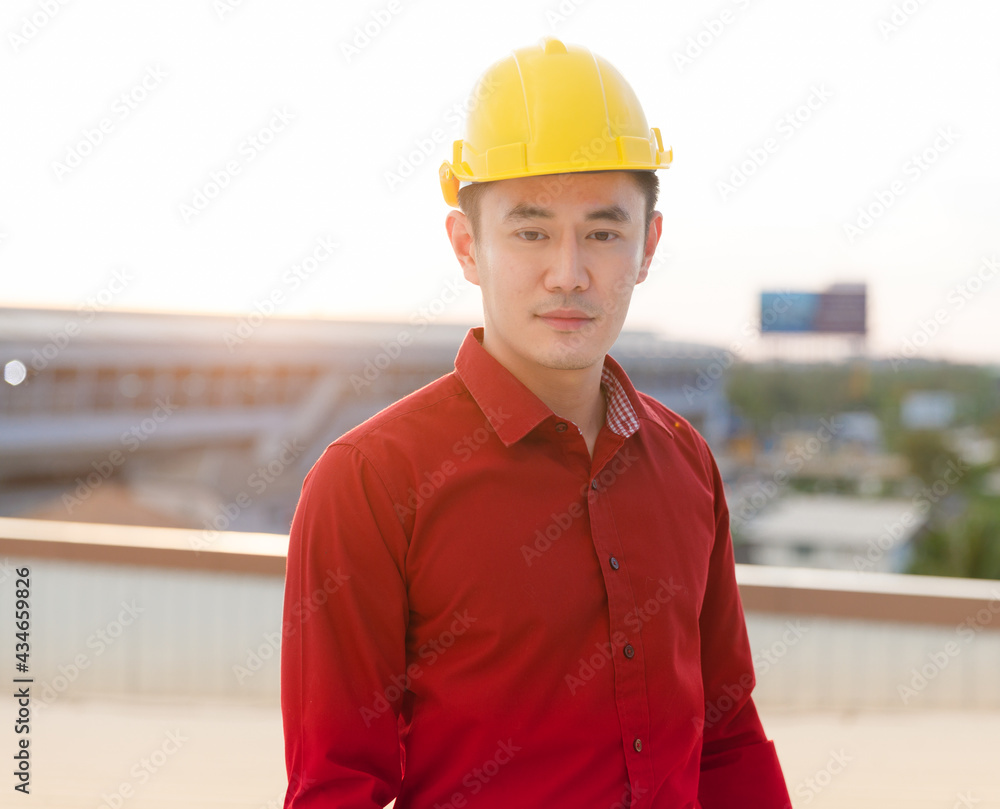 Asian builder on construction site