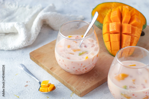 Photos two cups of creamy mango sago dessert from Hongkong