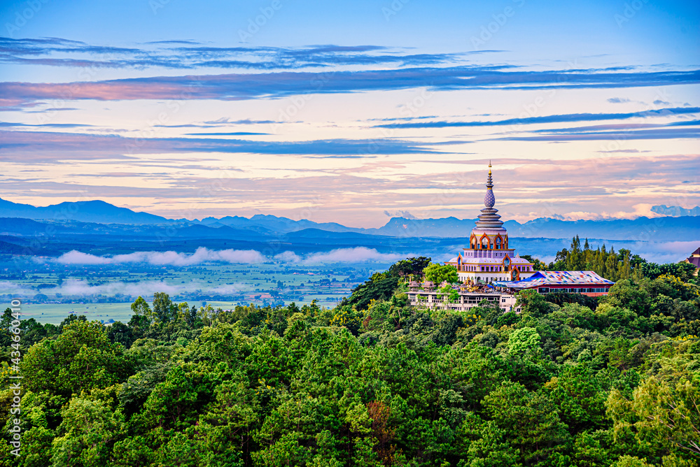 Beautiful pagoda of Tha Ton Temple set amid green mountains in Chiang Mai,Thailand.
