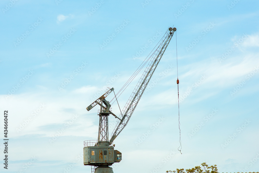 cargo crane on blue sky background cargo crane on blue sky background