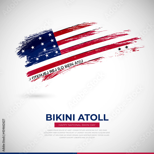 Happy national day of Bikini Atoll country. Creative grunge brush of Bikini Atoll flag illustration photo