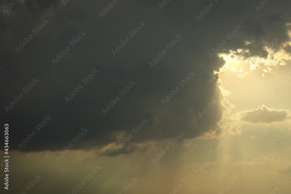 Beautiful sunset sky above clouds with dramatic light