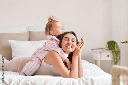 Happy woman and her little ...