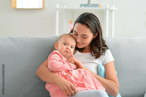 Happy woman and her little ...