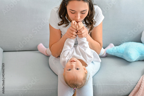Happy woman and her little ...