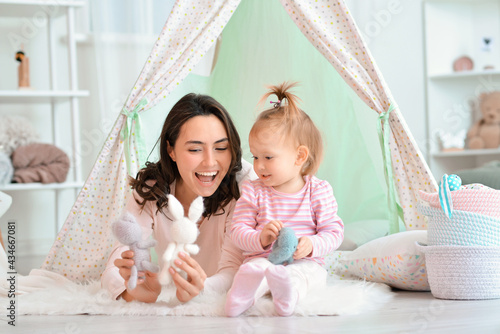 Happy woman and her little ...