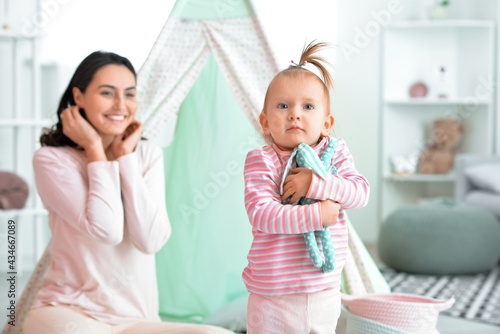 Happy woman and her little ...