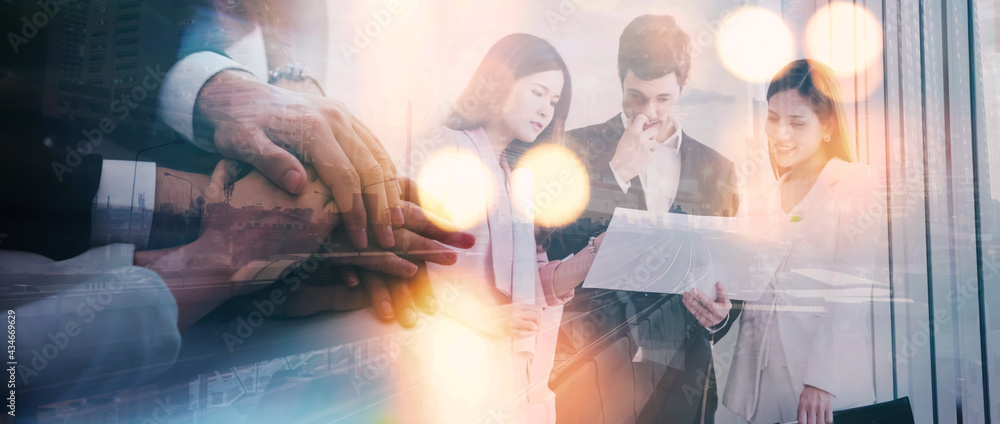 Fototapeta premium Double exposure of team businesspeople coordination and join hands deal agreement business.