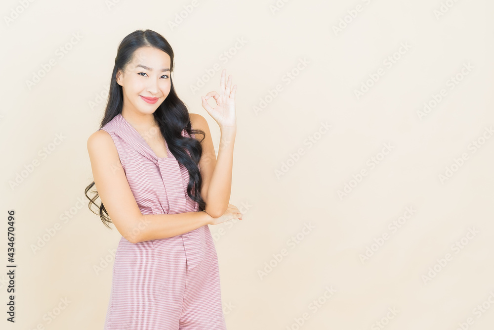 Portrait beautiful young asian woman smile with action Portrait beautiful young asian woman smile with action