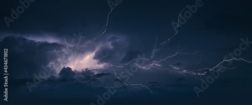 Storm. Lightning in the landscape.Thunderstorm Clouds with Lightning