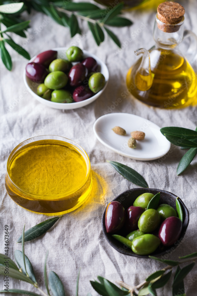 Extra virgin olive oil on a table Extra virgin olive oil on a table