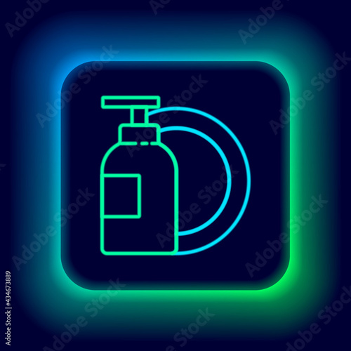 Glowing neon line Dishwashing liquid bottle and plate icon isolated on black background. Liquid detergent for washing dishes. Colorful outline concept. Vector