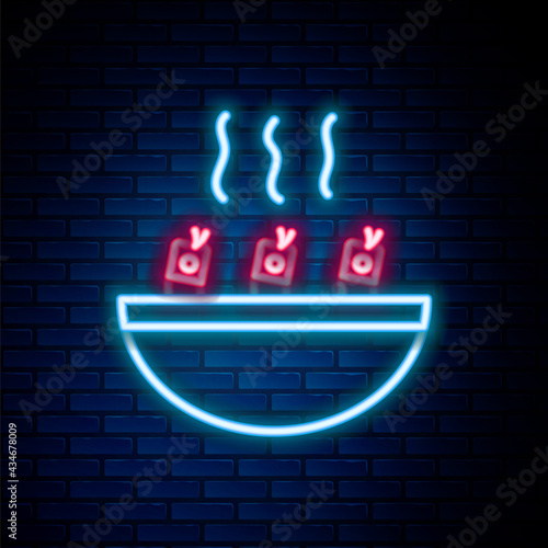 Glowing neon line Soup with shrimps icon isolated on brick wall background. Tom yum kung soup. Colorful outline concept. Vector