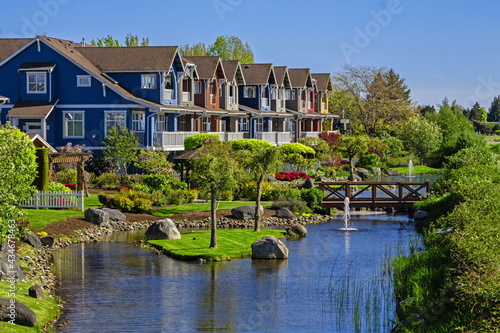 Fotografija Residential district with village of townhouses  in a picturesque location near