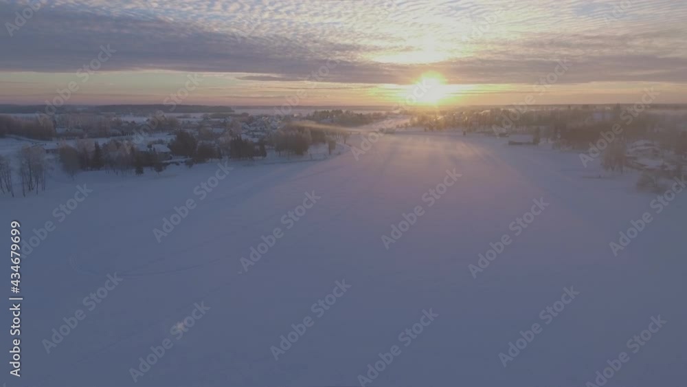 Frozen Snowy River In Winter. Aerial Flying Backwards. Frozen Snowy River In Winter. Aerial Flying Backwards.
