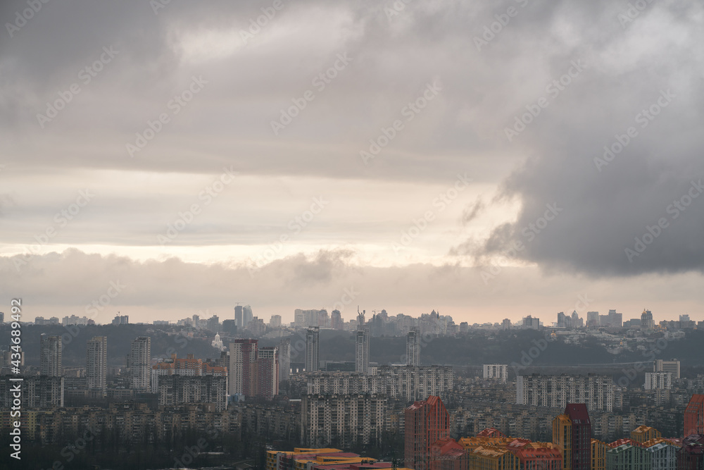 Roof top view of apartment residental neighbourhood with industrail zone in Kyiv Ukriane. Autumn rainy weather and capital city