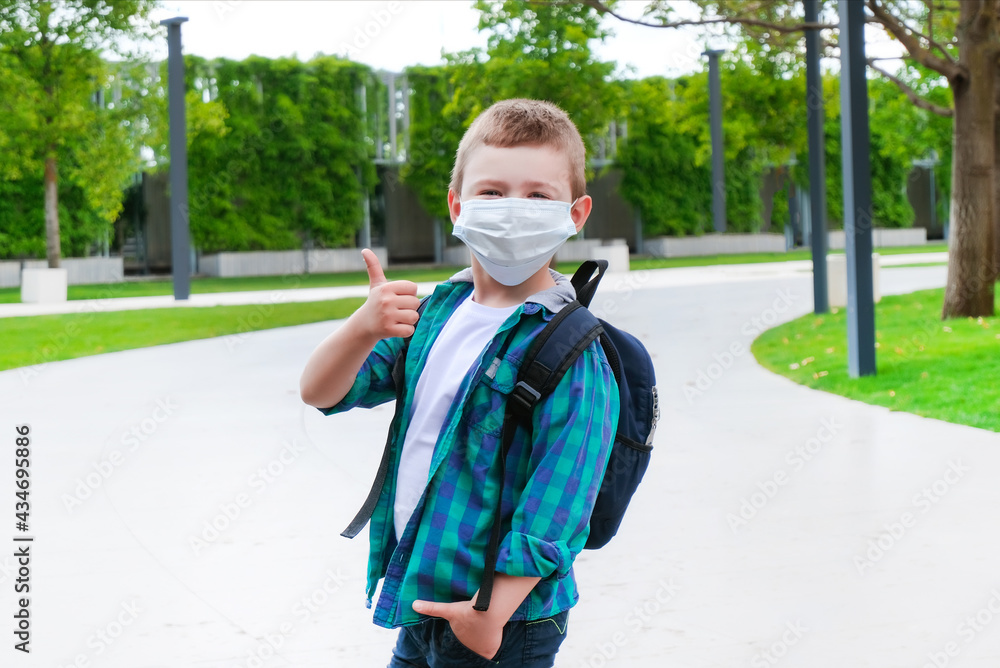 Schoolboy on the way to school. Back to school Schoolboy on the way to school. Back to school