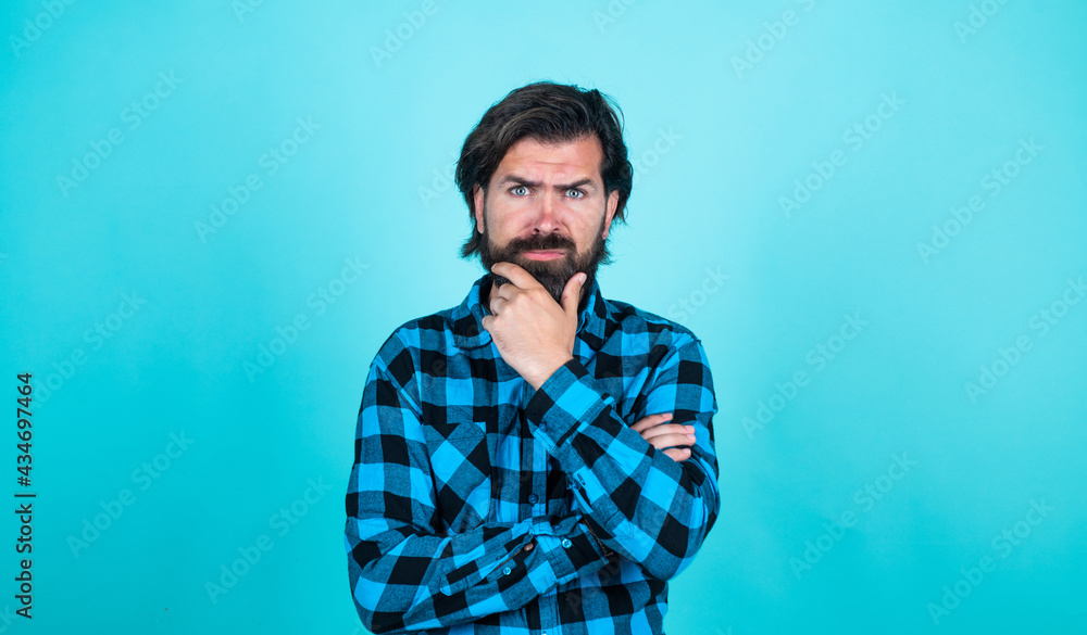thoughtful guy. mature man has moustache. bearded man in checkered shirt. brutal guy with emotional face. casual male fashion look. serious handsome hipster. barbershop thoughtful guy. mature man has moustache. bearded man in checkered shirt. brutal guy with emotional face. casual male fashion look. serious handsome hipster. barbershop