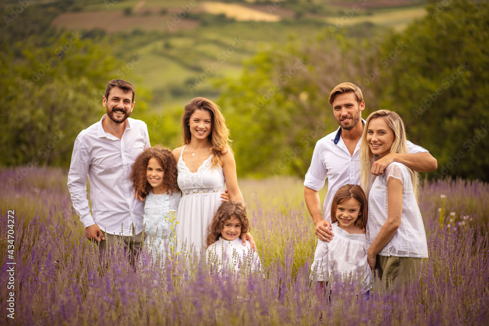 Large group of people standing in lavender filed. Large group of people standing in lavender filed.
