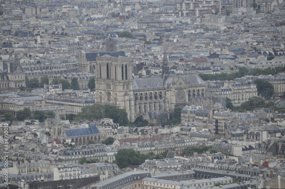 Beautiful pan view of Paris with  Notre Dame de Paris cathedral in center, France