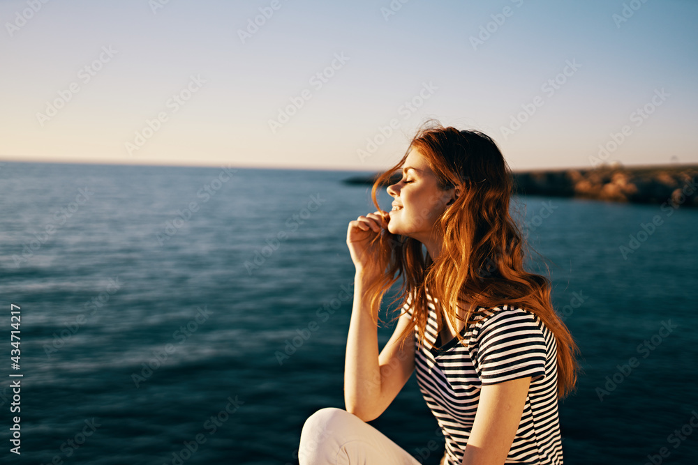 woman near the sea at sunset summer t-shirt sky model woman near the sea at sunset summer t-shirt sky model