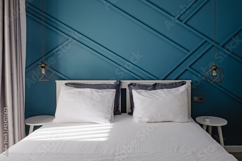 Wallpaper Mural Stylish bedroom in contemporary style with blue colored wall Torontodigital.ca