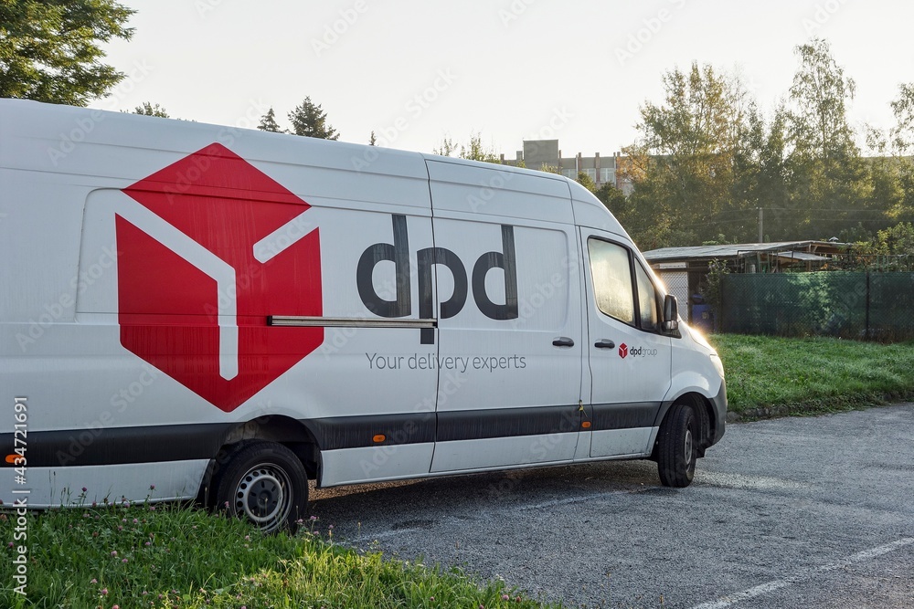 The parked white van of DPD delivery company which delivers parcels,  packages and other goods Stock Photo | Adobe Stock