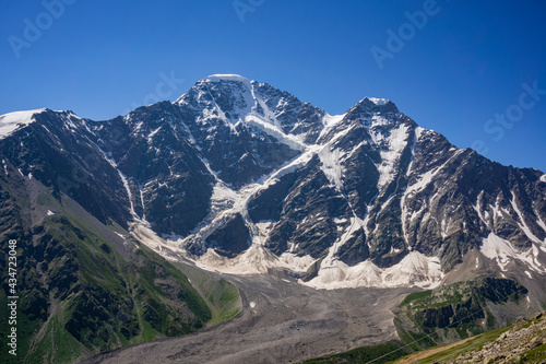 Glacier Seven on mount Donguzorun. View from Mount Cheget, Kabardino Balkaria region. Russia. Altitude is 3000 metres. Lifting on Cable Car.