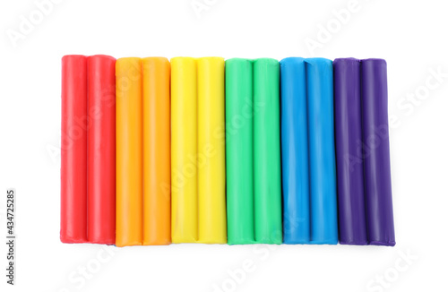Many different colorful plasticine pieces on white background, top view