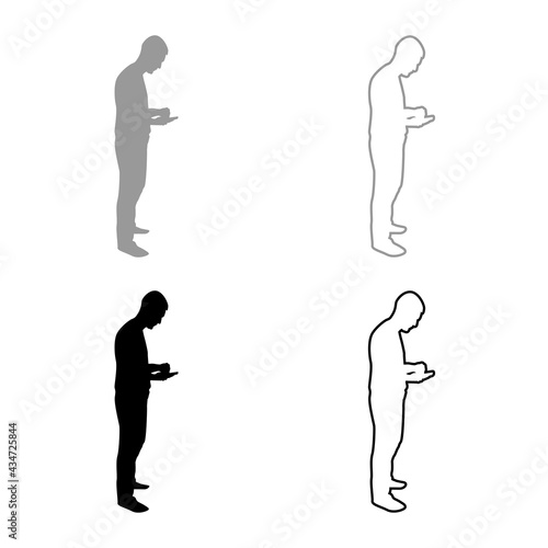 Man holding smartphone phone Playing tablet Male using communication tool Idea looking phone addiction Concept dependency from modern technologies silhouette grey black color vector illustration 