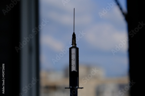 syringe on the background
