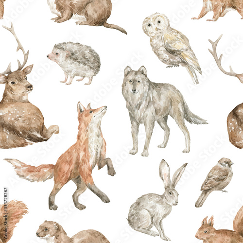 Watercolor seamless pattern with wild forest animals. Deer, fox, wolf, hare, squirrel, owl, birds, hedgehog, weasel. Woodland wildlife. 