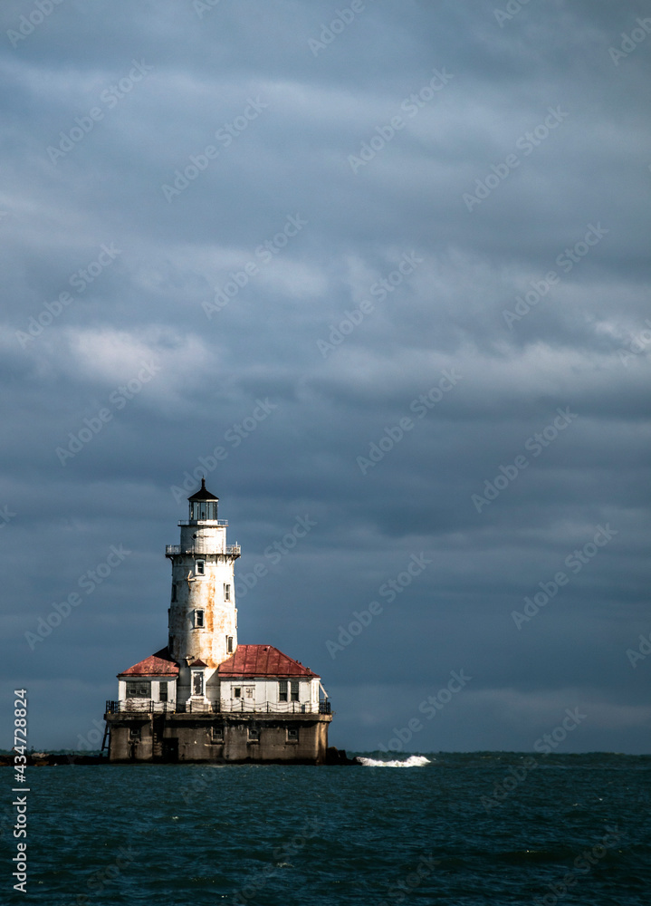 dramatic sky in Chicago Harbor Light House.