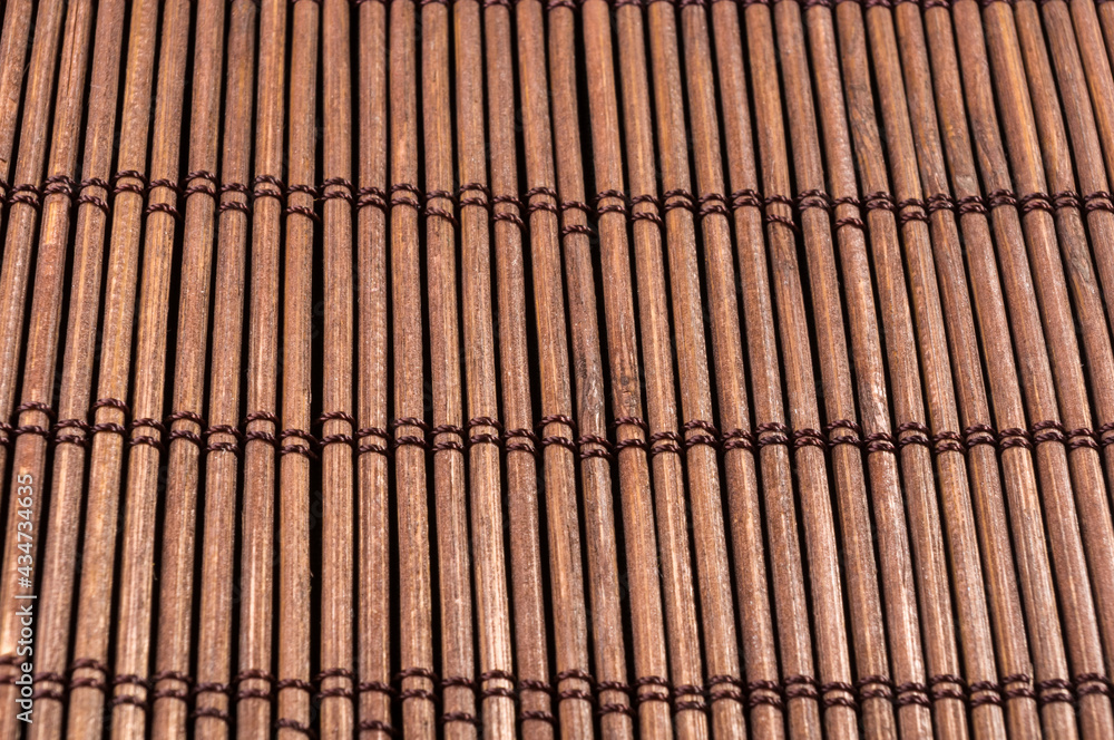 brown bamboo Mat - stand food, close-up, macro brown bamboo Mat - stand food, close-up, macro