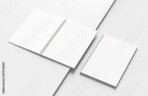 Spiral binder notebook mock up isolated on modern white background. 3D illustration