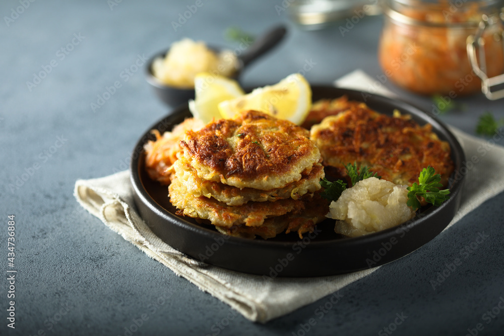 Homemade potato pancakes with apple sauce Homemade potato pancakes with apple sauce