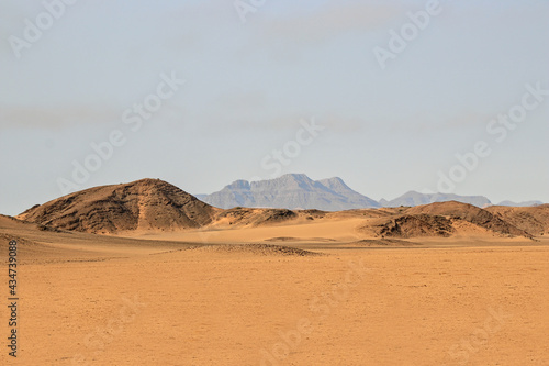 stunning desert landscape with distant mountains, Namibia photo