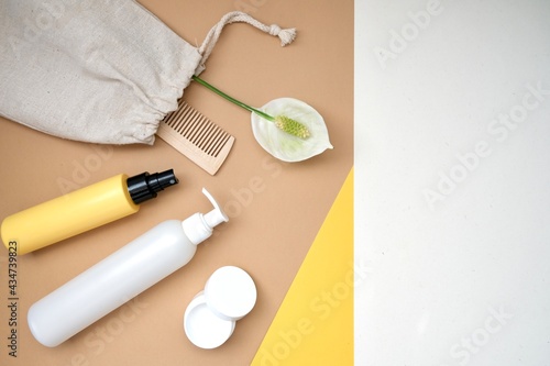 Summer set of hair care products (shampoo, spray, mask) on a white beige background. The concept of natural hair care. flat lay. 