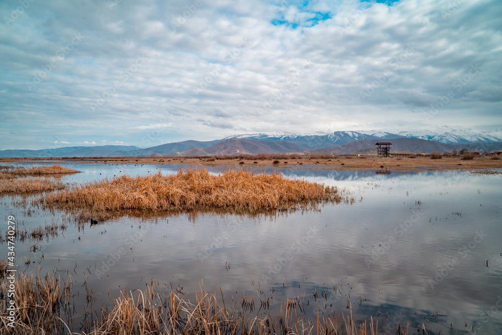 Moody view of landscapes with marshes and lakes inside the Central Anatolian Sultan Reedy (Sultansazligi) National Park, Turkey