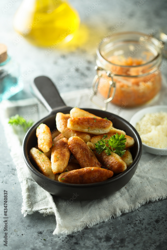 Traditional German potato dumplings served with parsley	