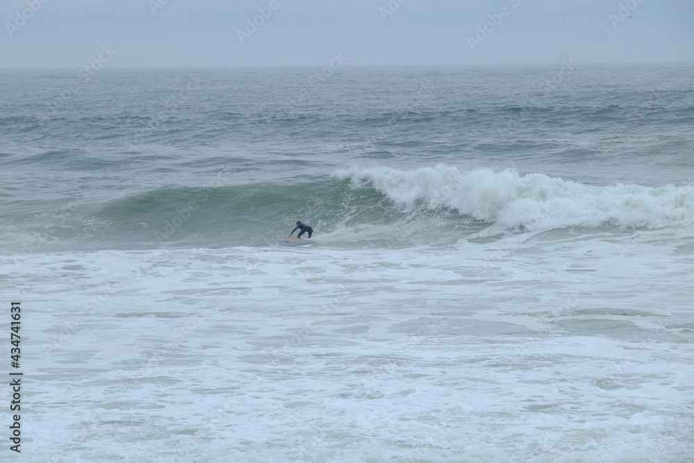 Some surfers enjoying big waves at la Govelle surf spot on the french Atlantic shore. France, city: Batz-sur-mer, the 9th may 2021. Some surfers enjoying big waves at la Govelle surf spot on the french Atlantic shore. France, city: Batz-sur-mer, the 9th may 2021.