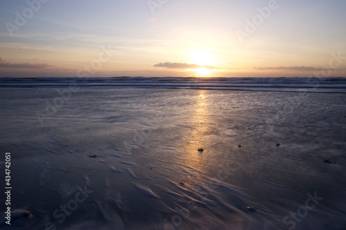 rising sun on the beach © Joy