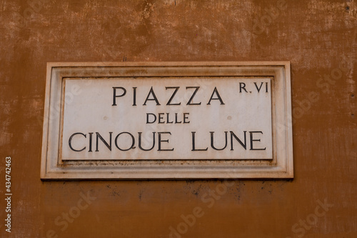 Street sign in the historical center in Rome, Italy, with the text: "Piazza delle Cinque Lune" © gallofilm