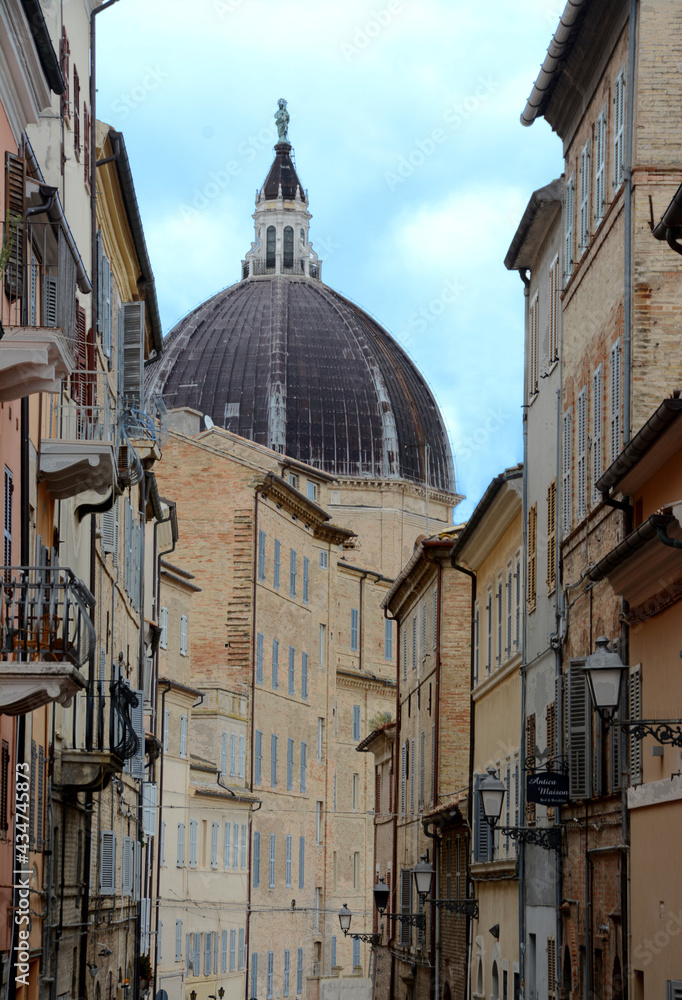 the dome of the Sanctuary of the Holy House of Loreto dominates the ancient alleys of the medieval old town