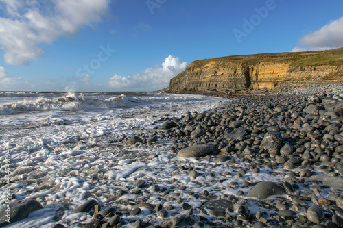 Dunraven Bay also known as Southerndown Beach on the Glamorgan Heritage Coast - limestone formed in the Carboniferous Period to the Blue Lias of the Liassic period. photo