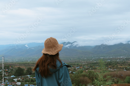 Young women thihking and look at view of the mountain ,calm and mindfulness concept