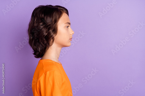 Profile side view portrait of attractive content serious boy copy space isolated over violet purple color background