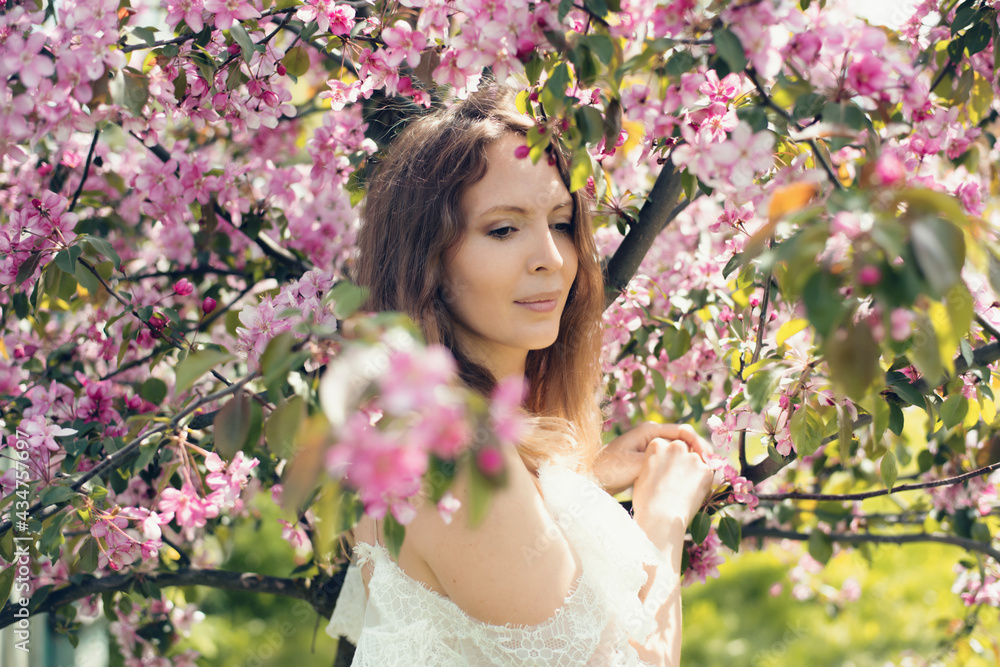 Beautiful young adult woman model Posing in a trendy white lace dress bride Beautiful young adult woman model Posing in a trendy white lace dress bride